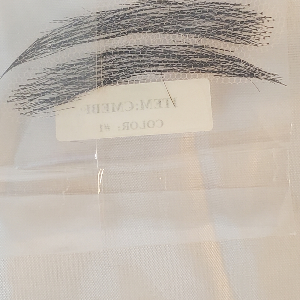 New Human hair eye brows, net backing in black.